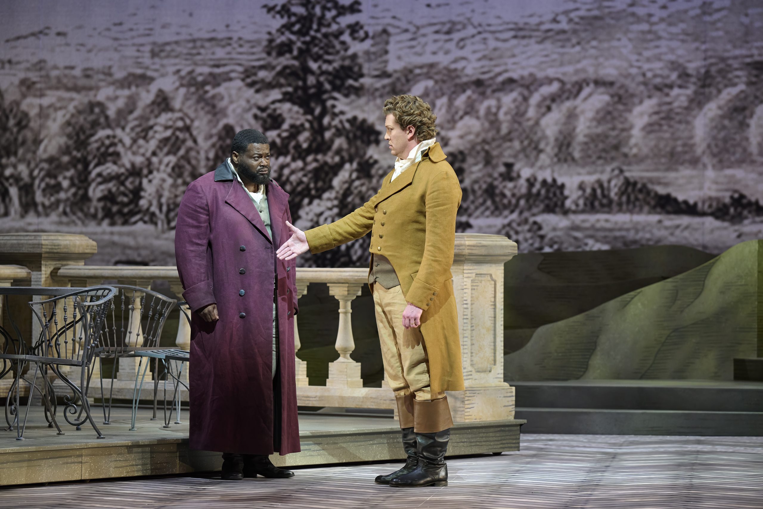 Albert holding out hid hand to Werther to shake